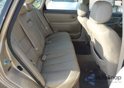 2004 Toyota Avalon Xl z USA, uszkodzony, nr VIN 4T1BF28B94U369328